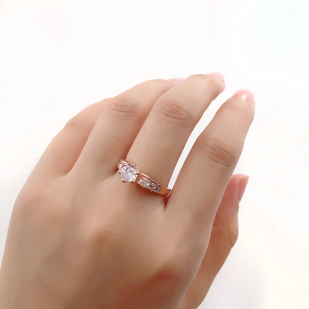 Rosé-Goldring mit geometrischem Stein